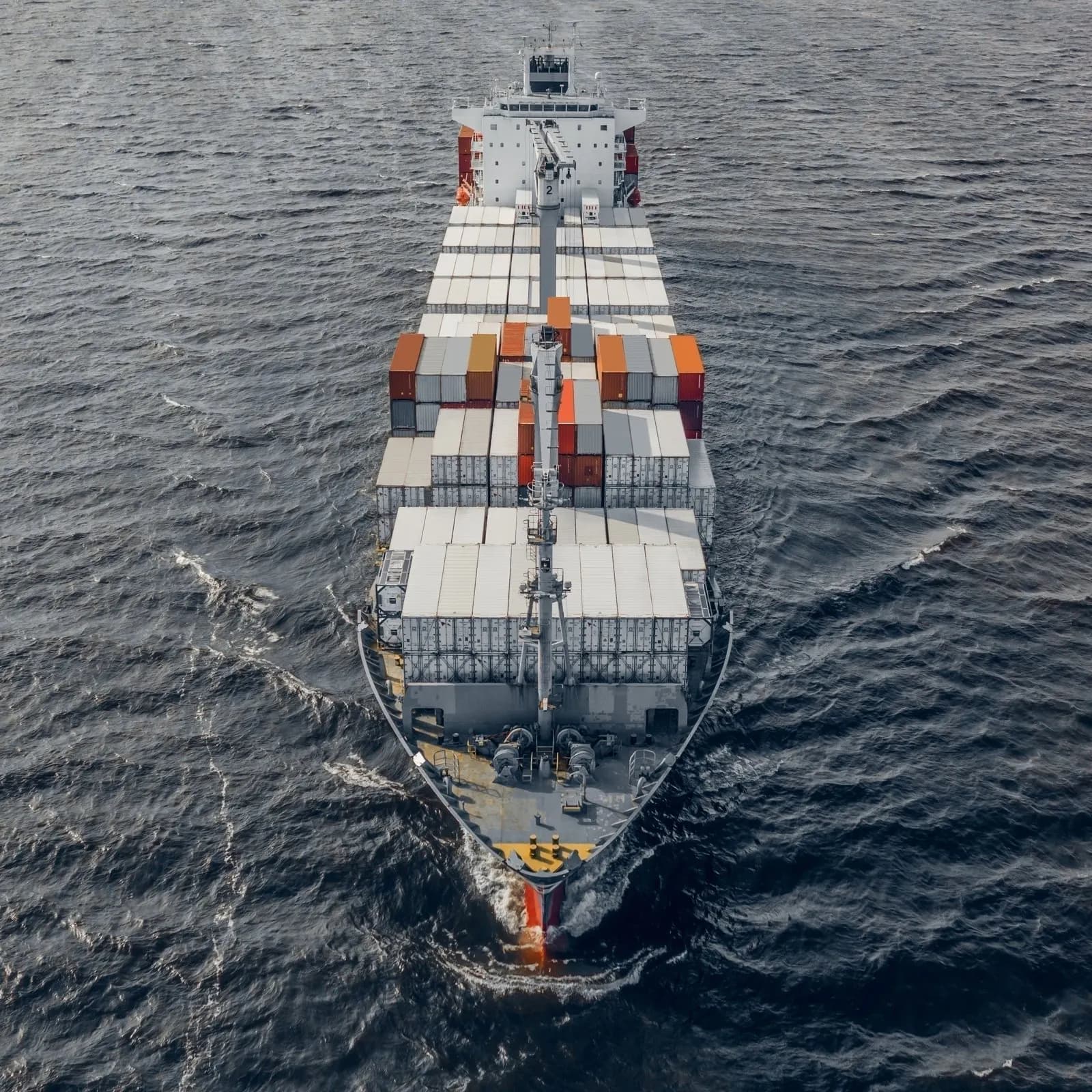 Laden container ship at sea, illustrating China's growing electric and low-carbon cargo fleet