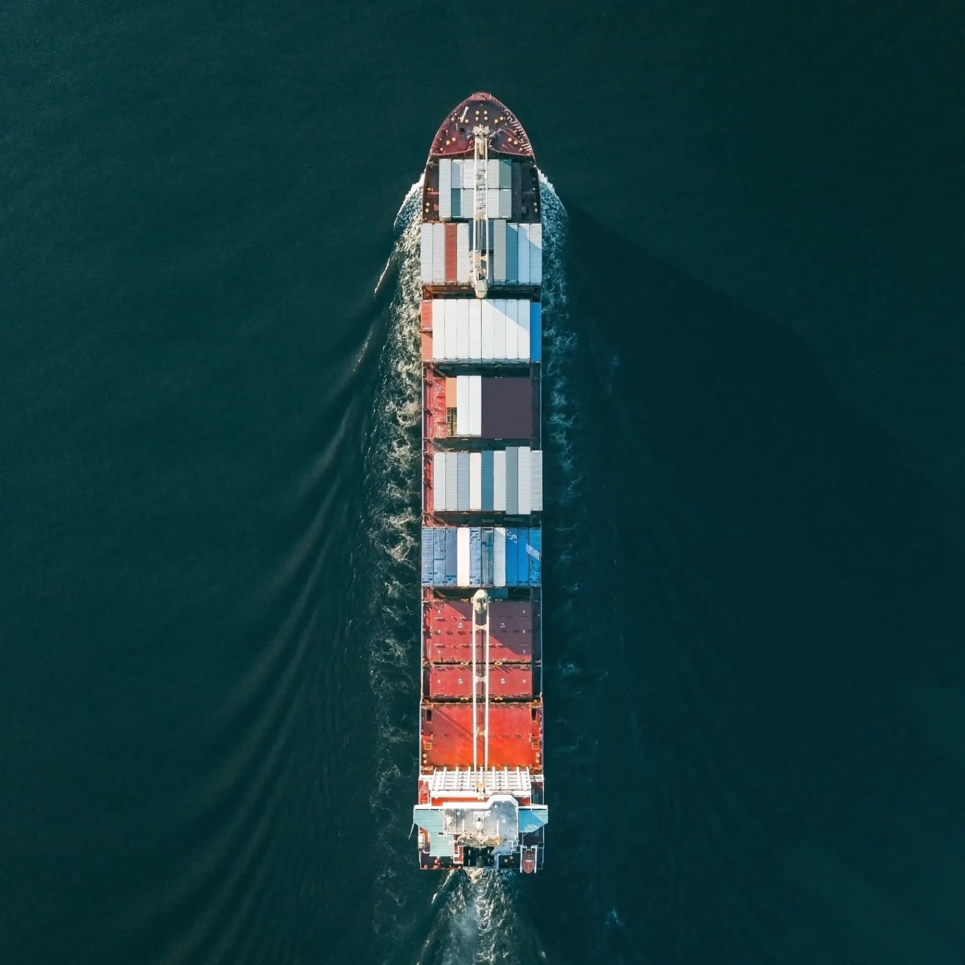 Ship transiting a canal, illustrating Suez Canal traffic and adjacent industrial investment