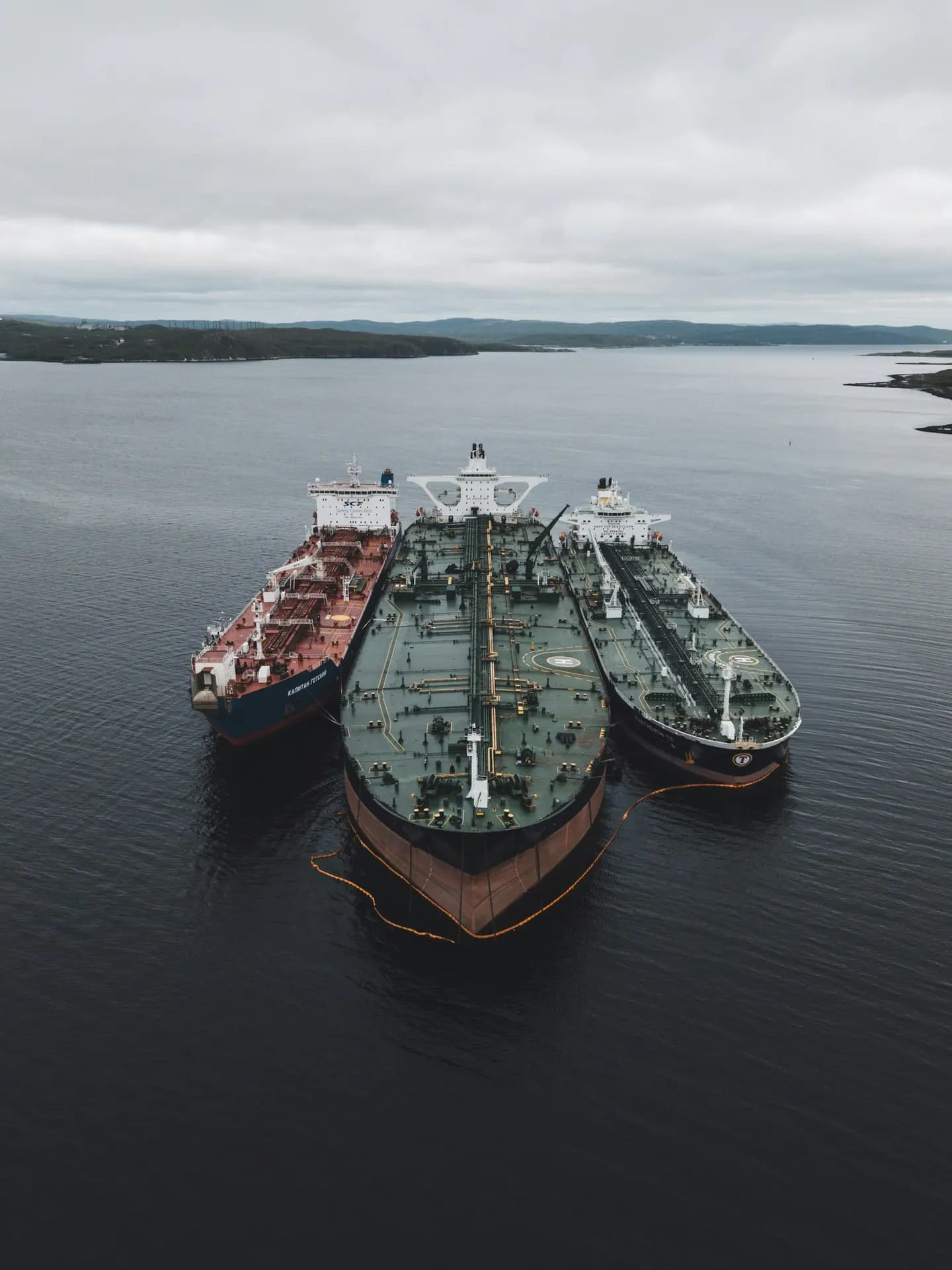 A tanker transiting a strait under insurance coverage