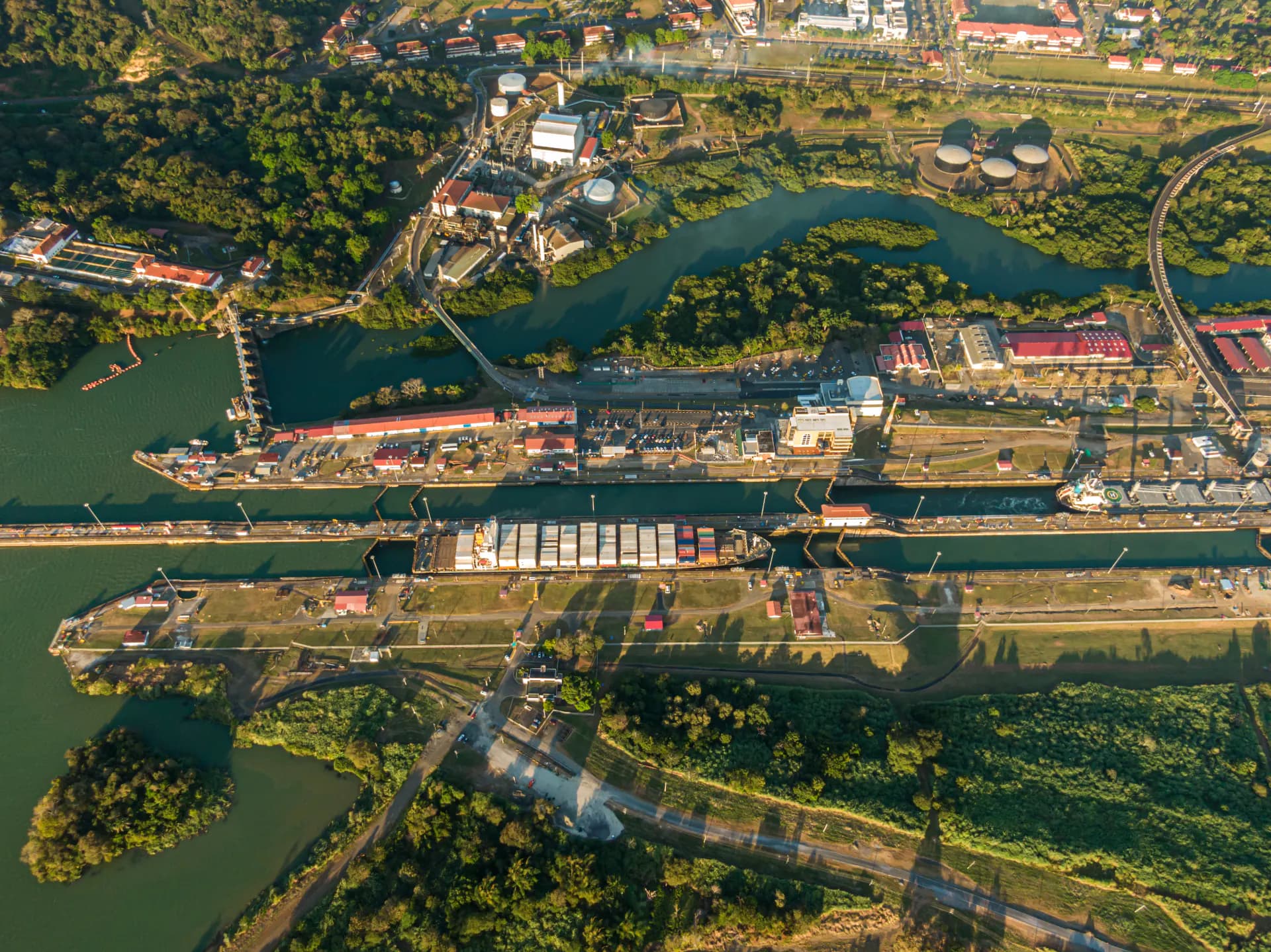 Aerial view of the Panama Canal locks with a vessel in transit