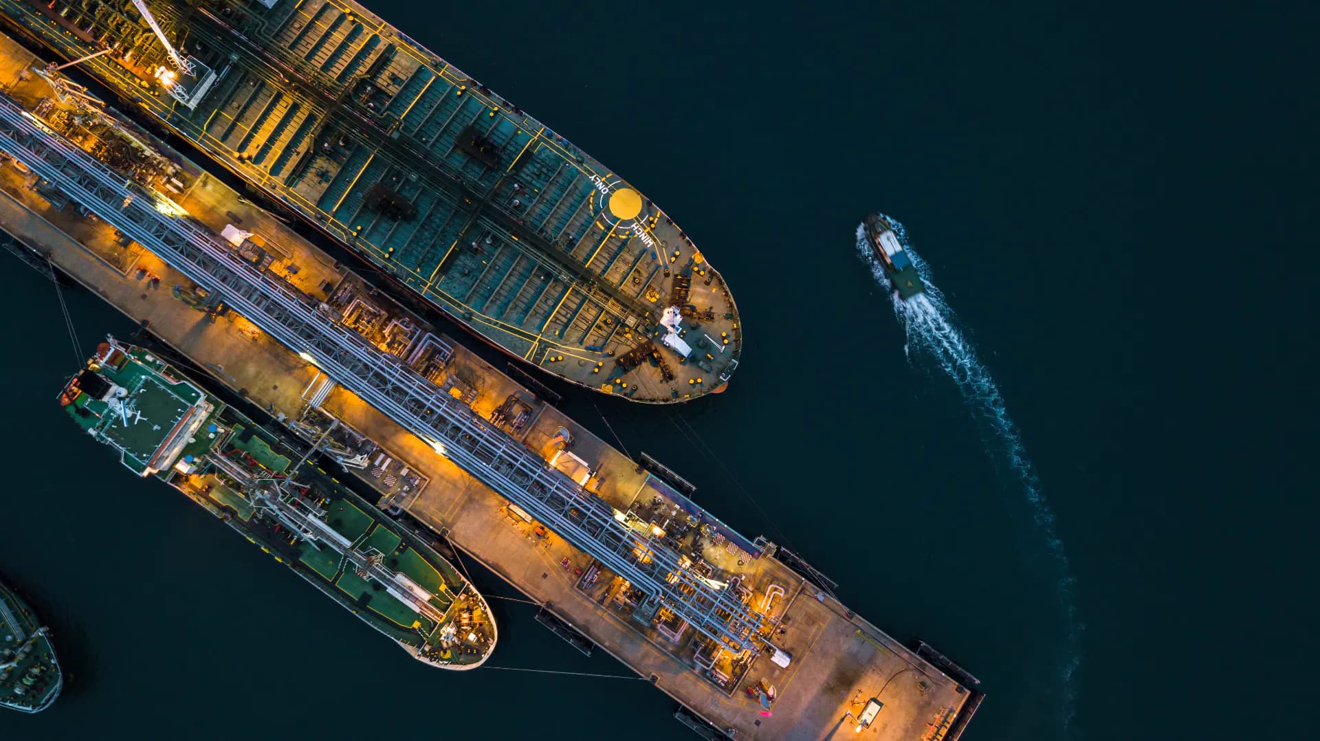 Tanker discharging alongside a port berth