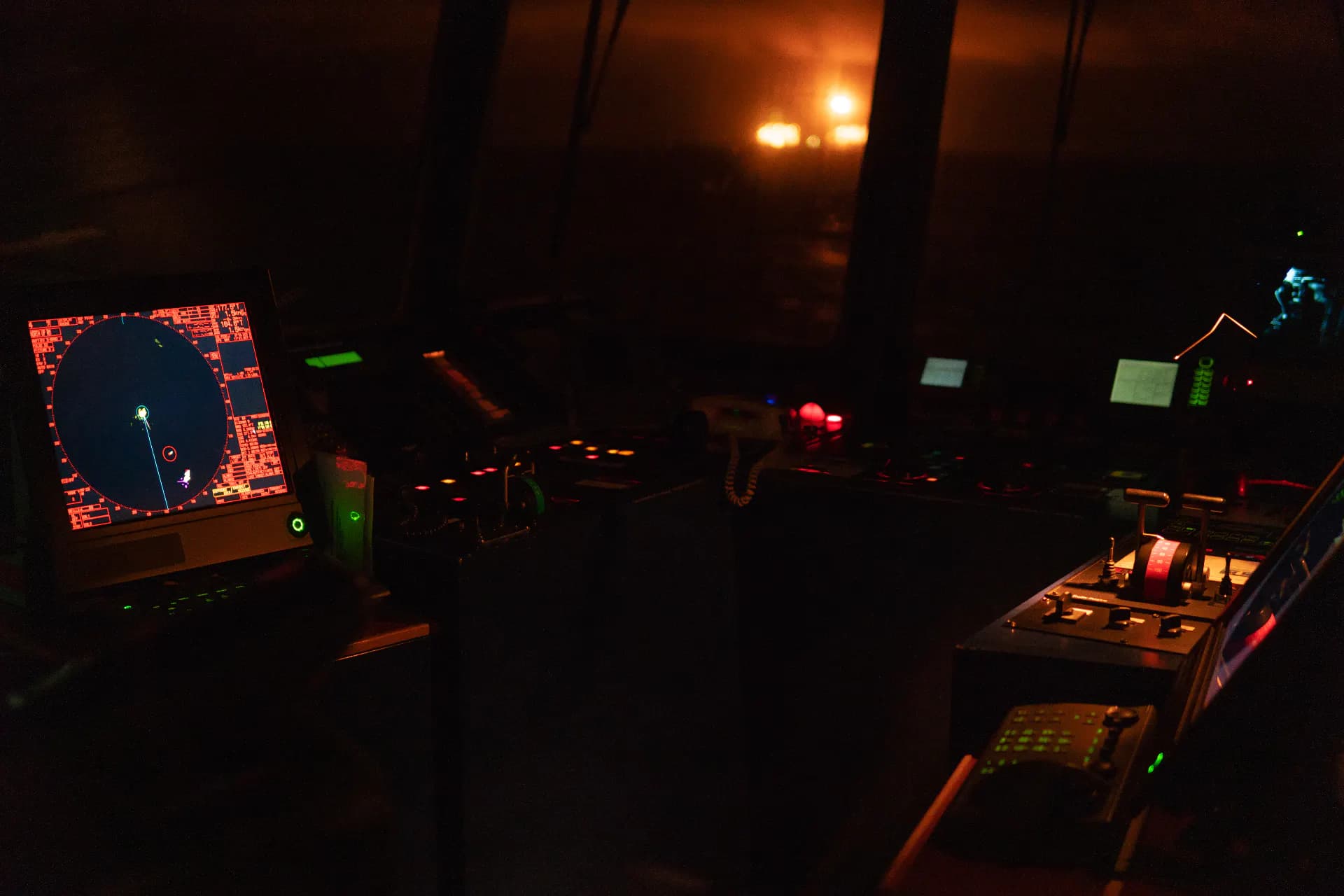 Radar and tracking displays in a darkened control room