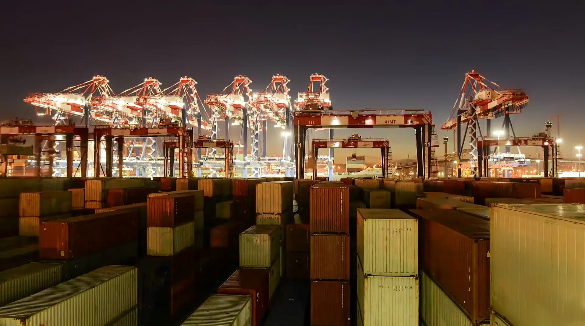 Container port terminal with cranes and containers