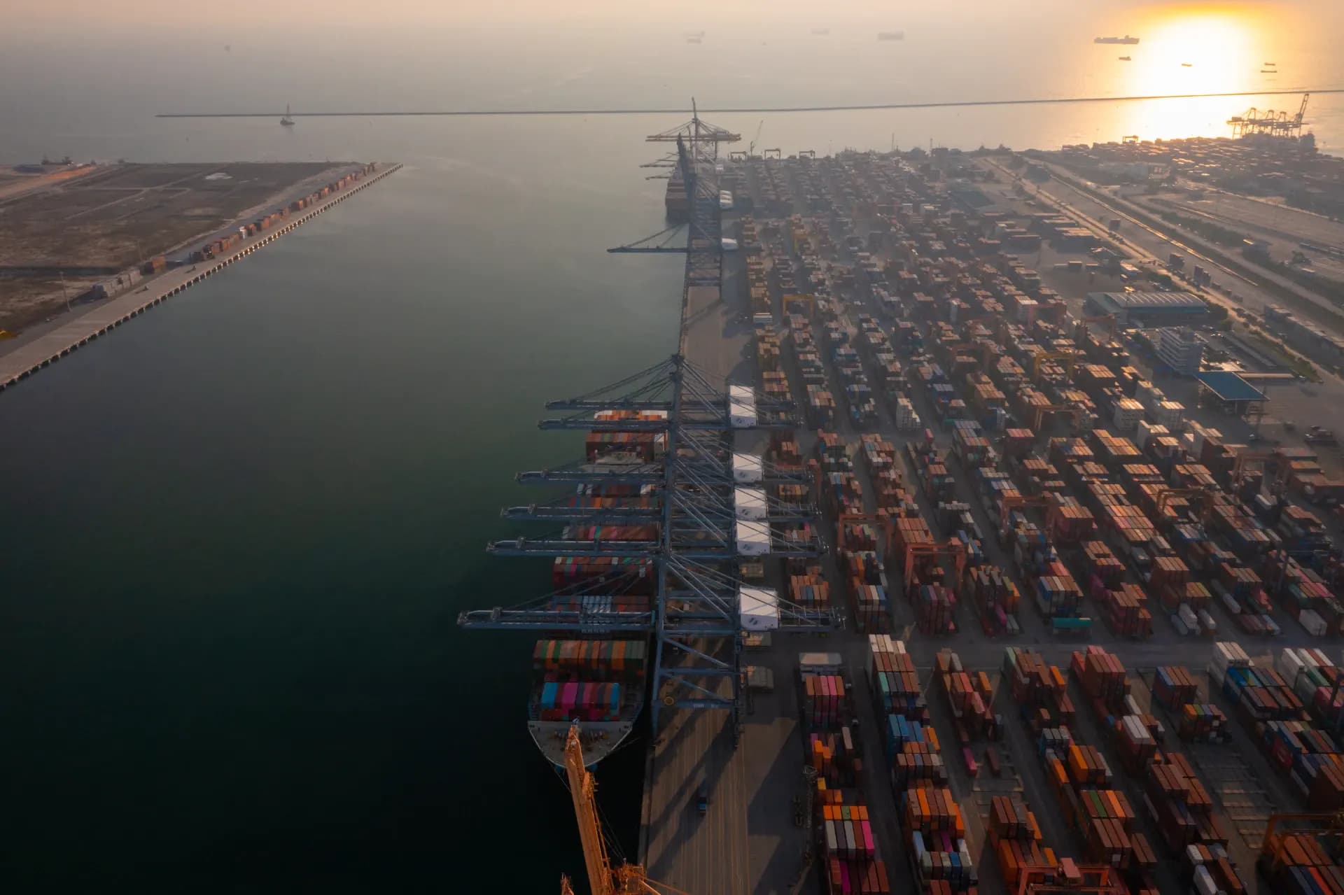 A container ship at sea, seen from directly above