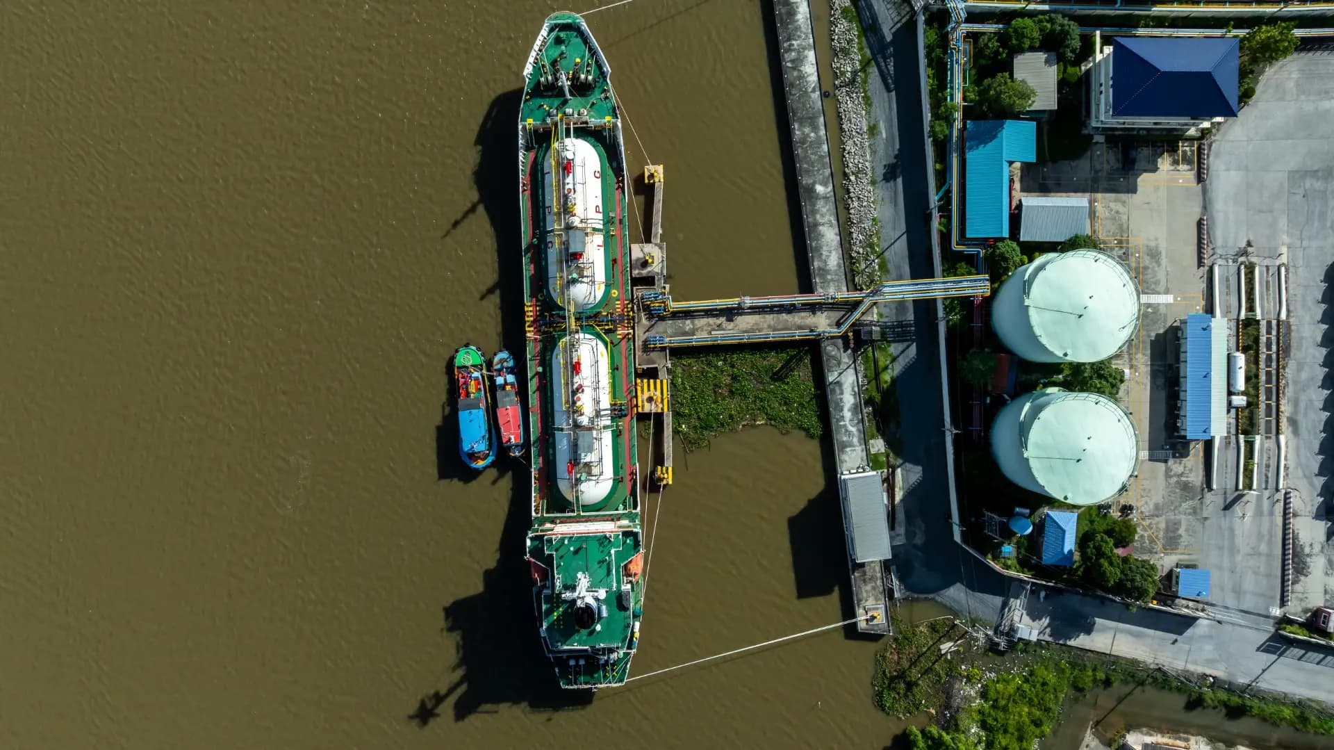 Aerial view of white storage tanks at a liquid bulk terminal