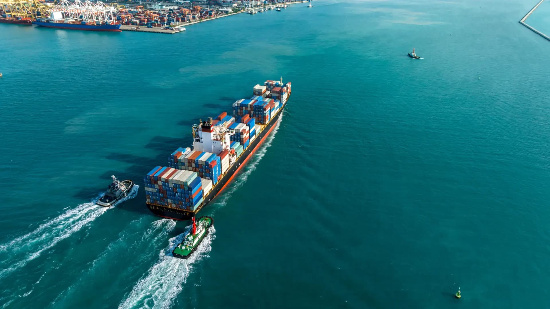 Aerial view of a loaded container ship, illustrating container freight markets