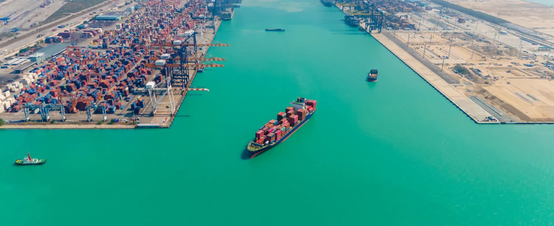 A container ship carrying export cargo at sea