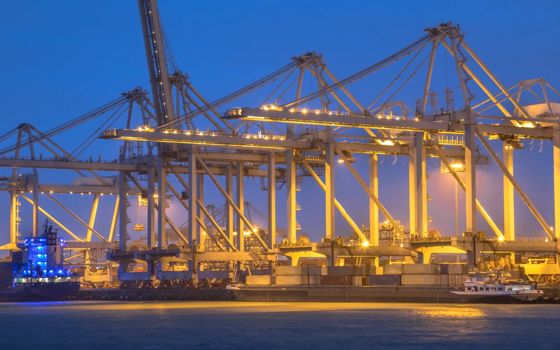 Container terminal at sunset, illustrating port security and container handling