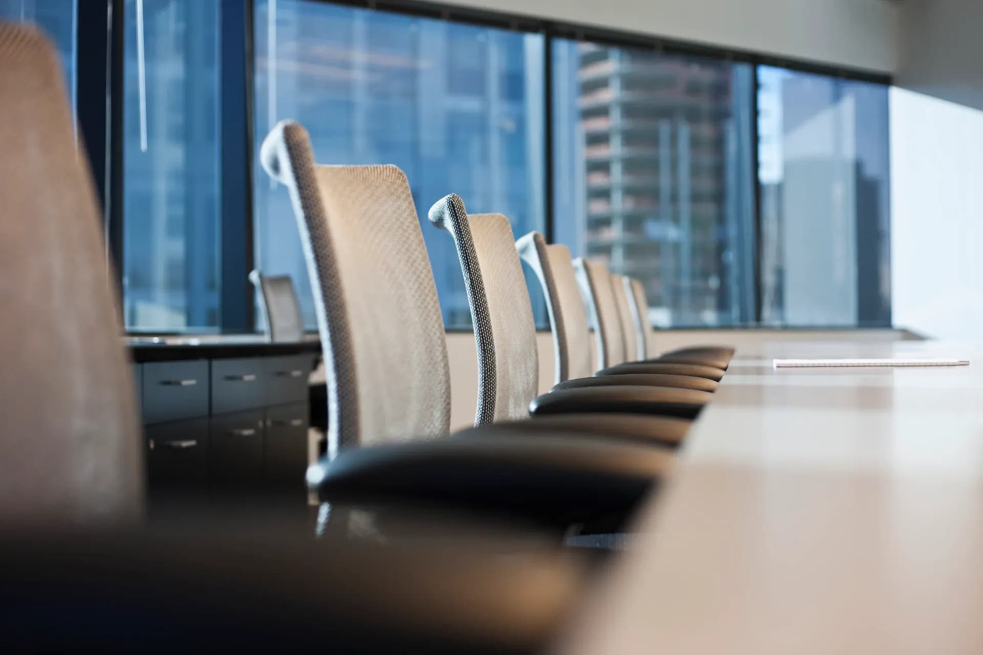 Conference room overlooking a city, illustrating international maritime policy discussions