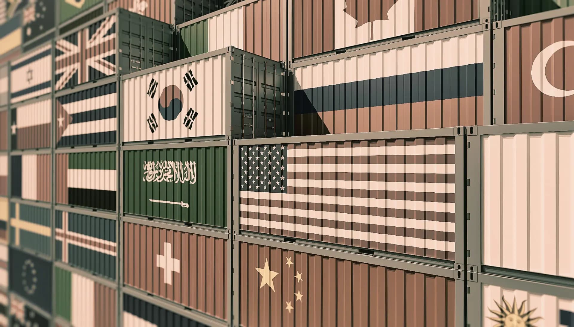 Stacked shipping containers marked with national flags