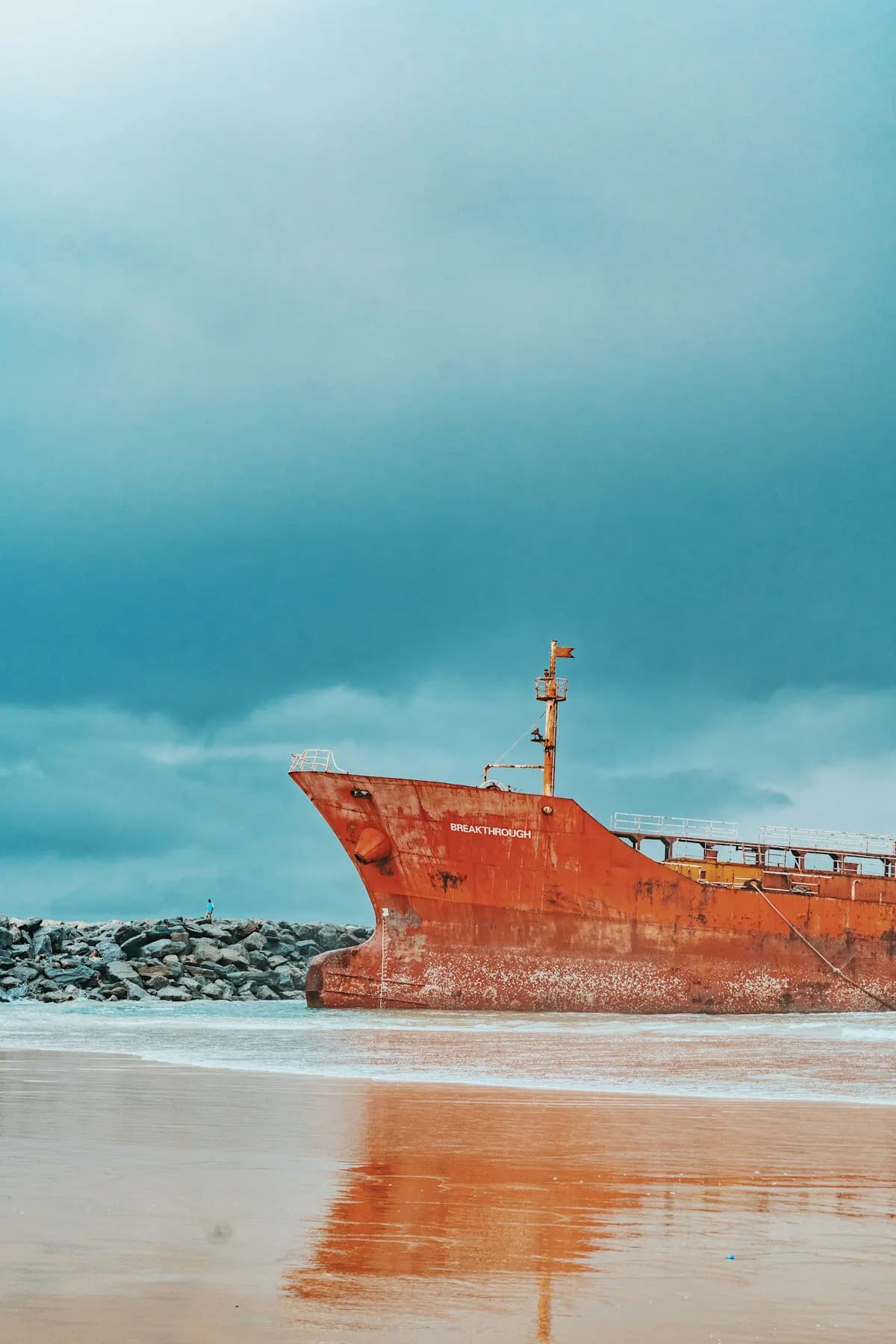 Rusting ship on the shore