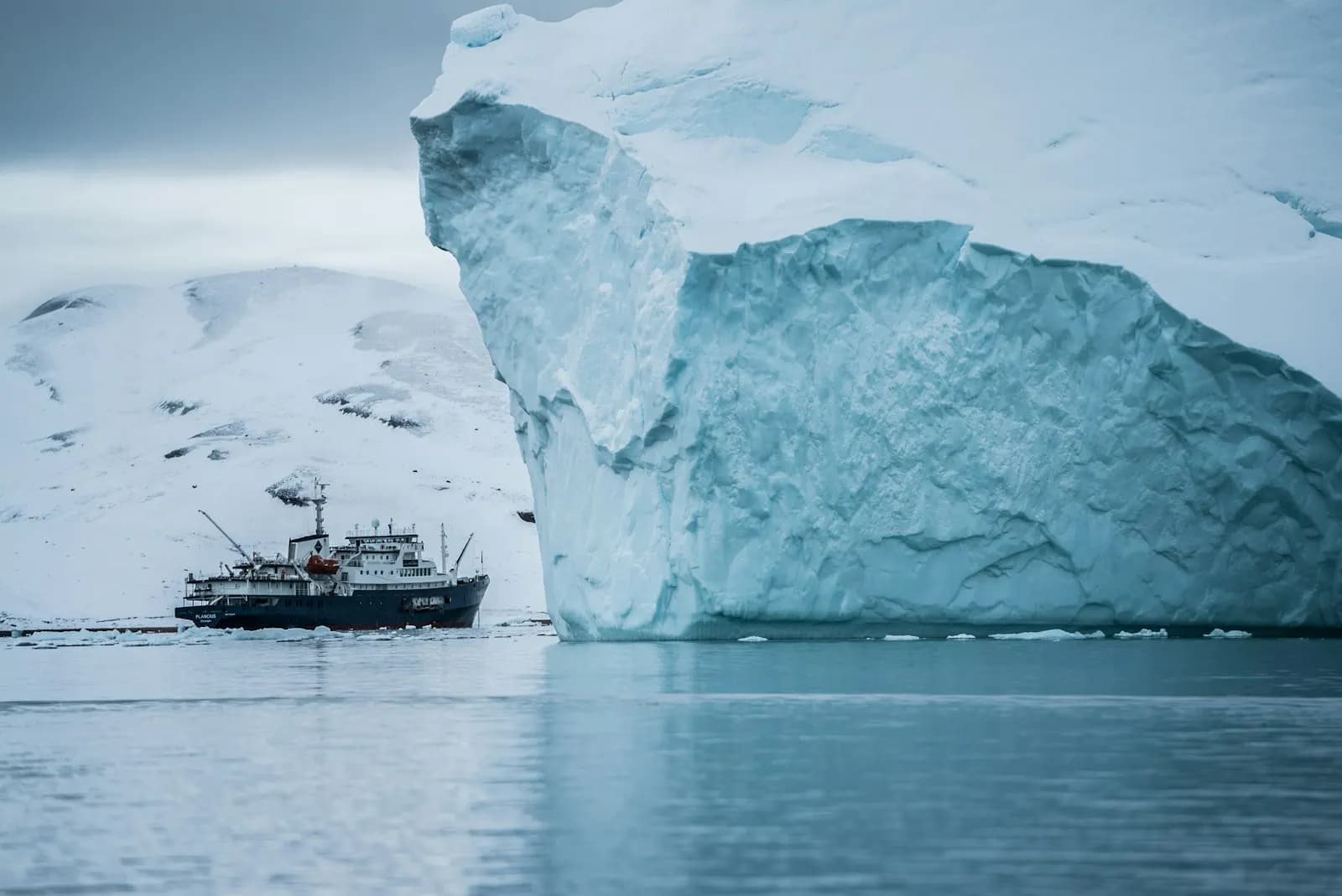 A research vessel navigating icy Arctic waters