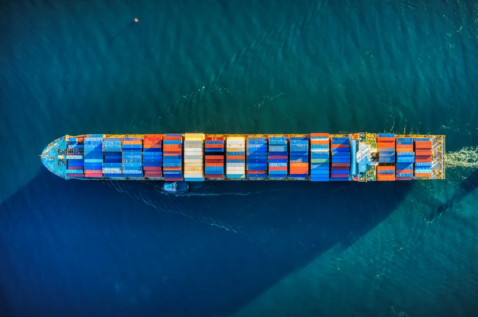 Container terminal cranes loading a vessel at a port