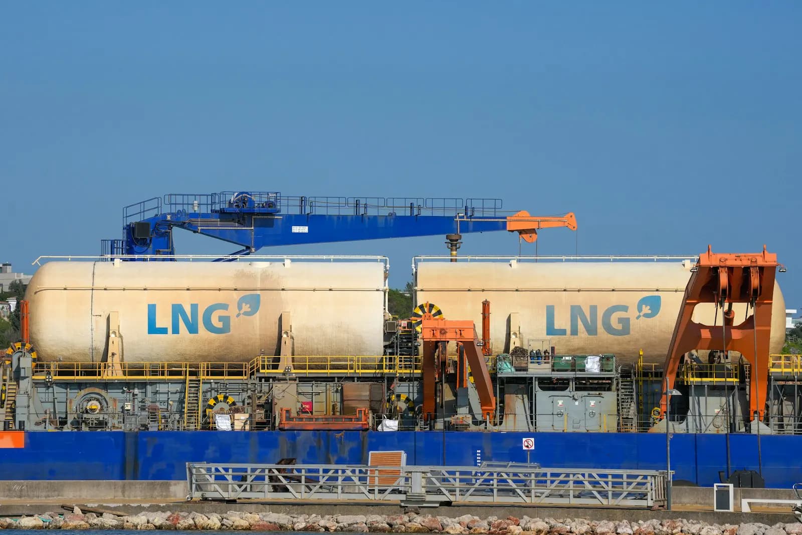 An LNG carrier under construction at a shipyard