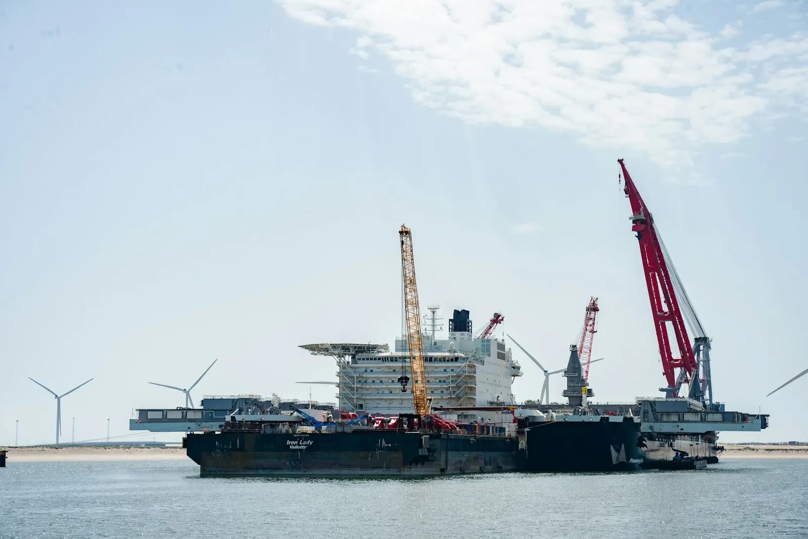 A jack-up wind turbine installation vessel at sea