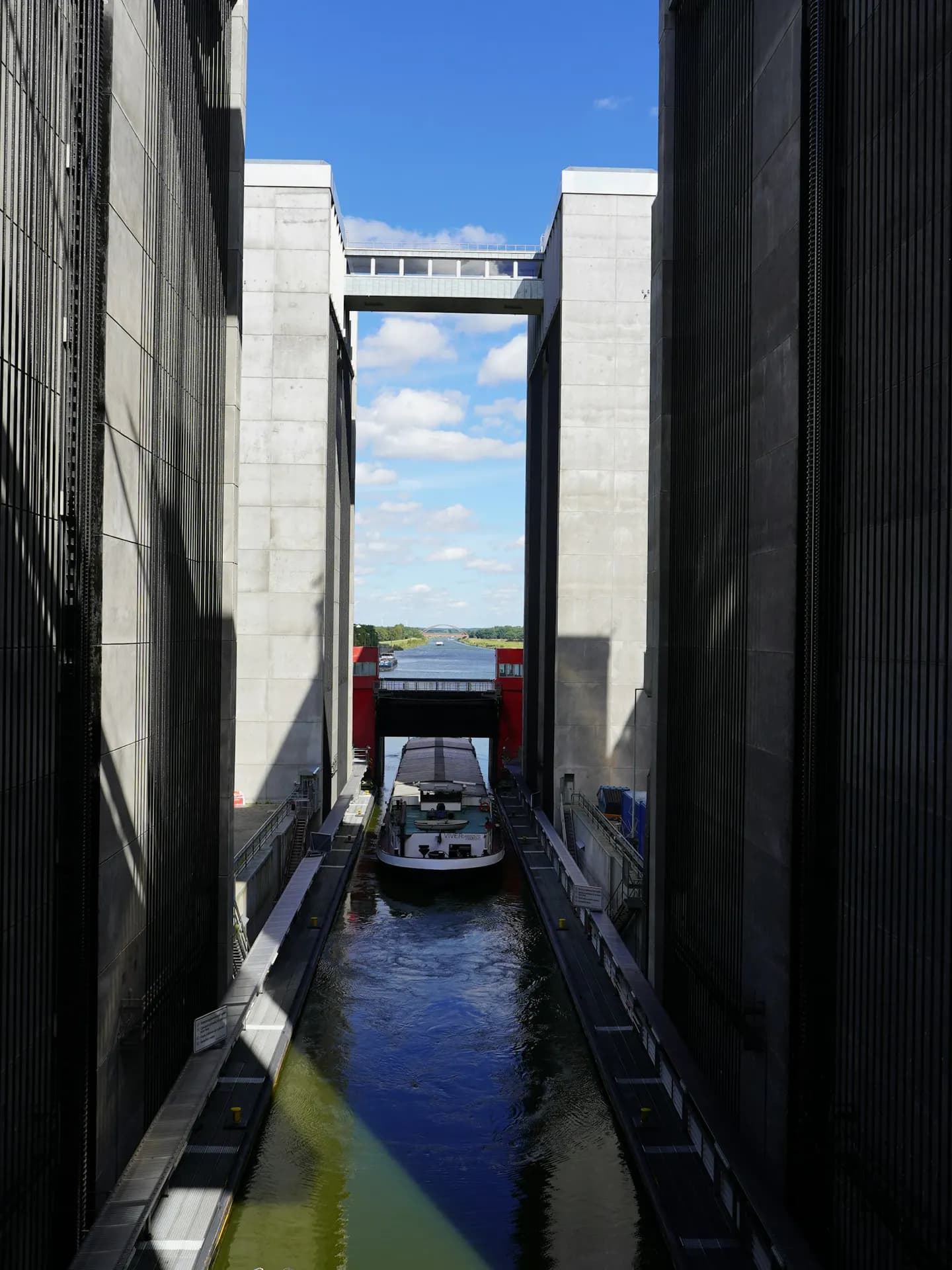 A vessel passing through a European canal lock