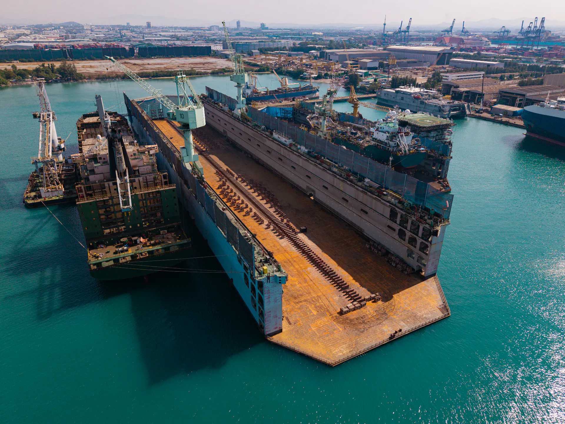 A large hull under construction in a building dock