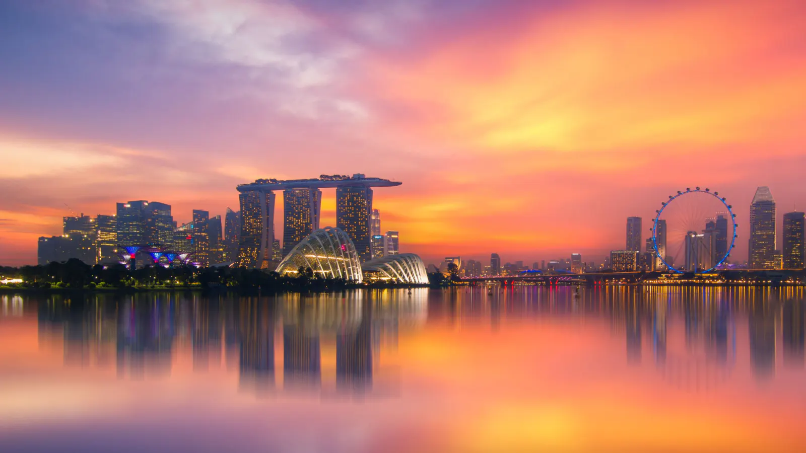 Ships at anchor off Singapore at dusk