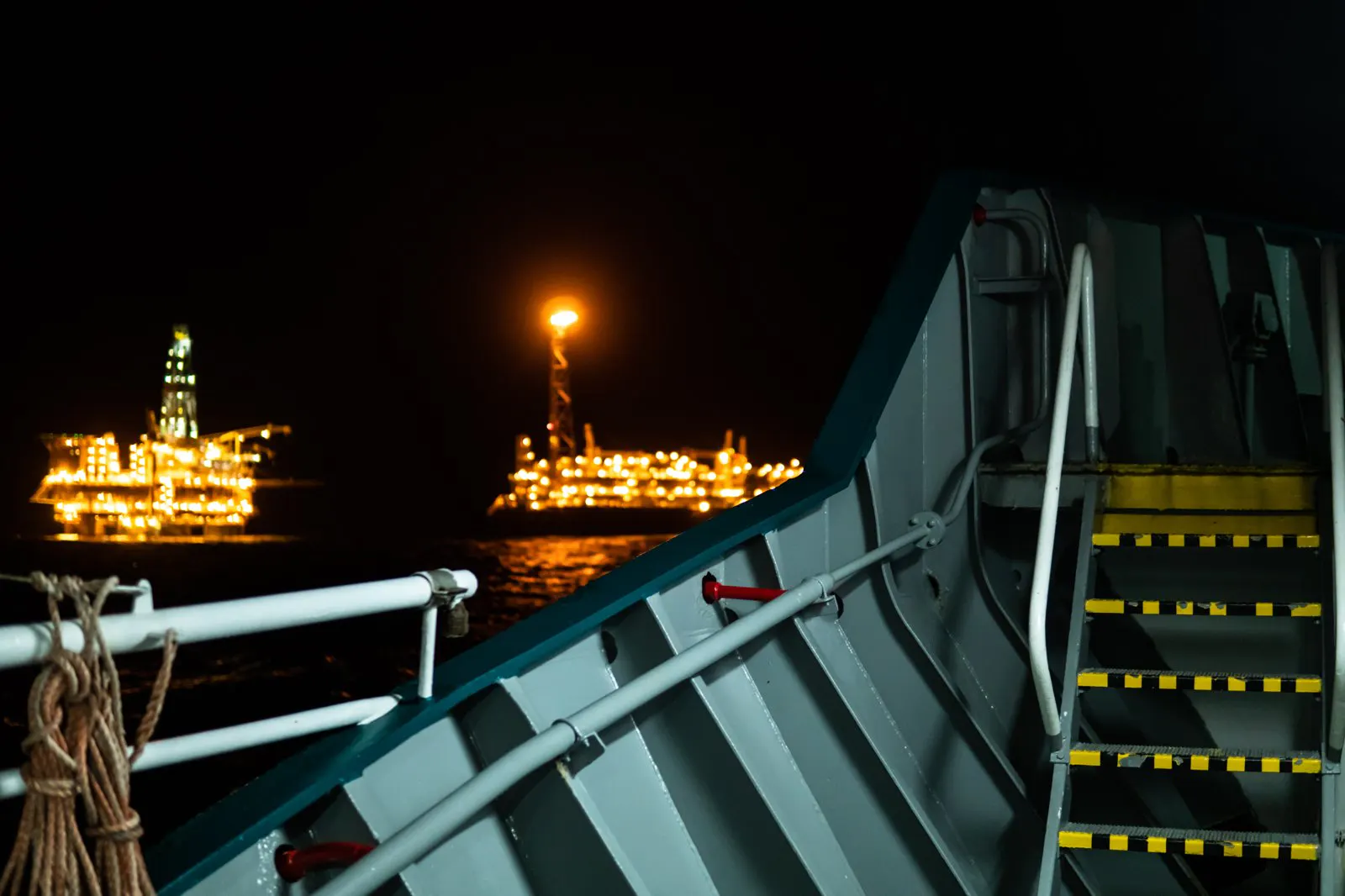 Offshore oil rigs at night