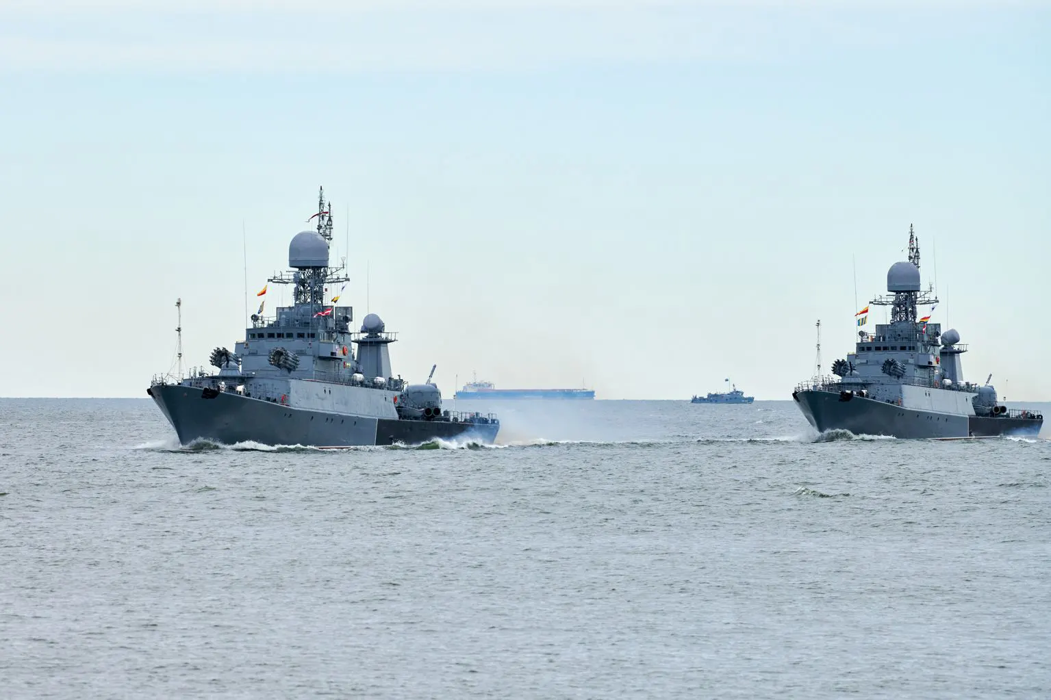 Navy vessels sailing on the open sea
