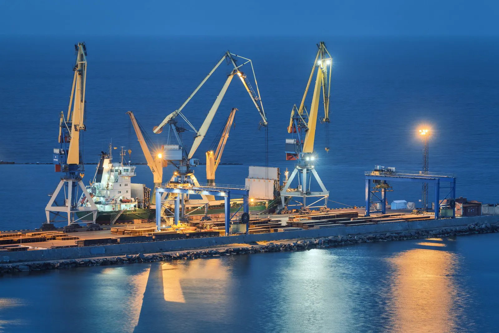 Port cranes on the Black Sea coast at night