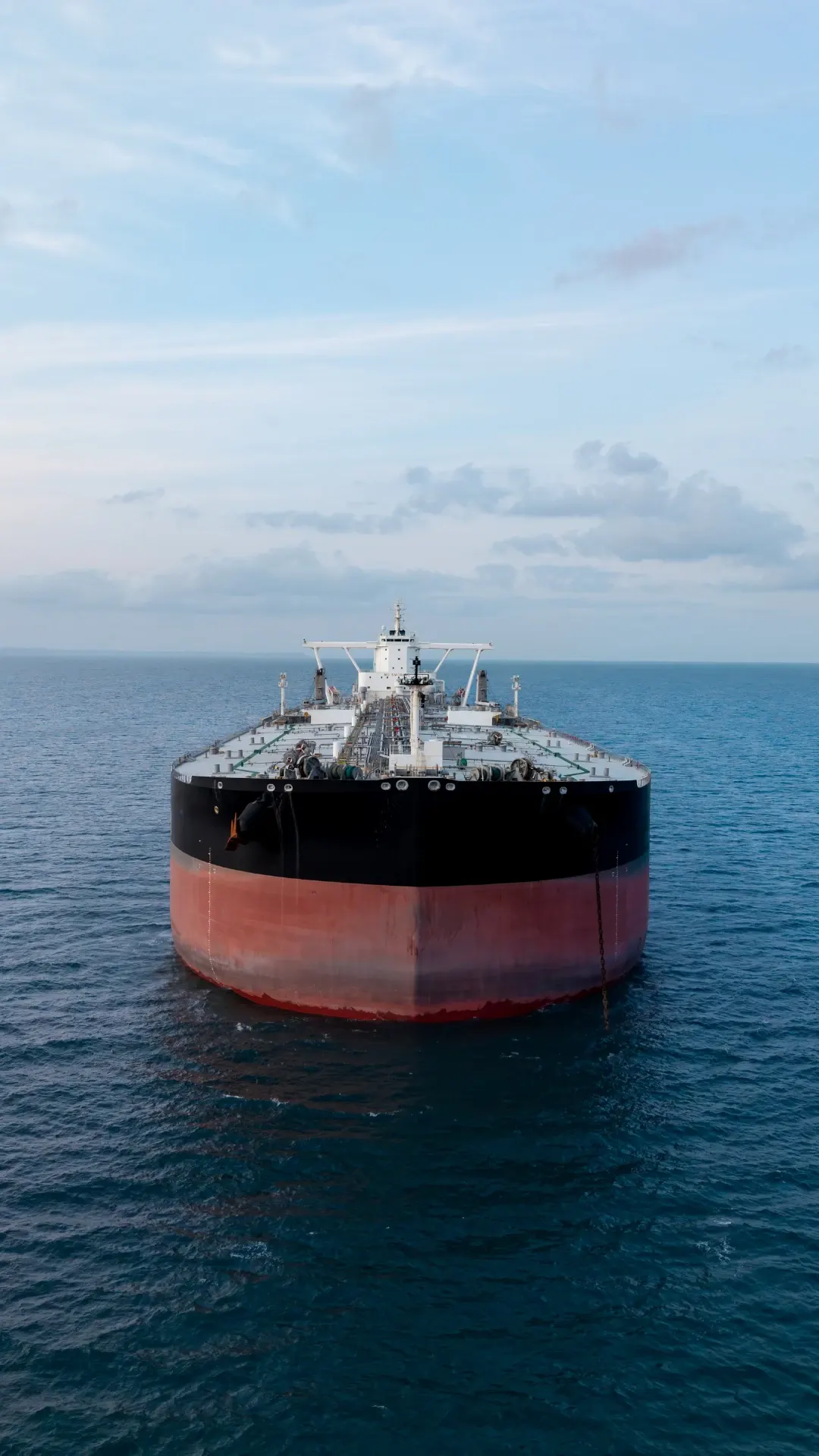 Bow of a laden crude oil tanker at sea