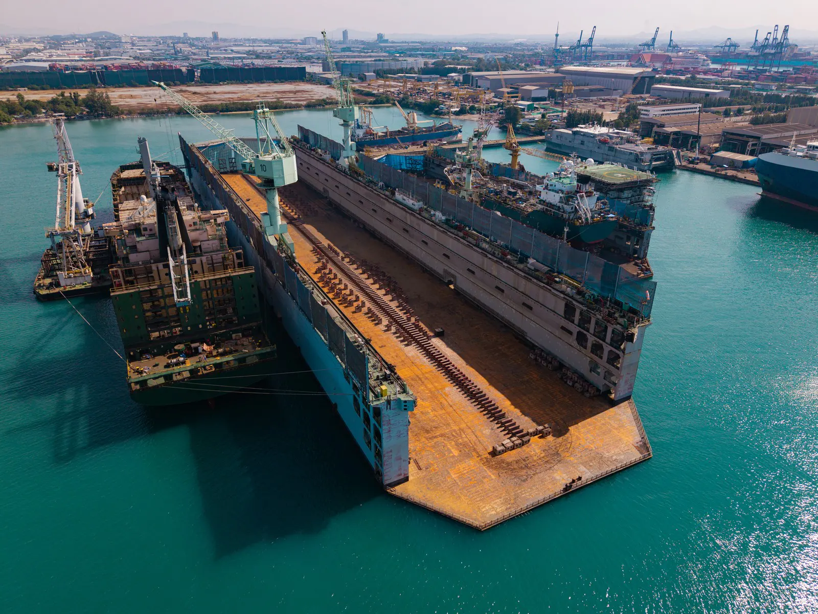 Floating dry dock at a shipyard