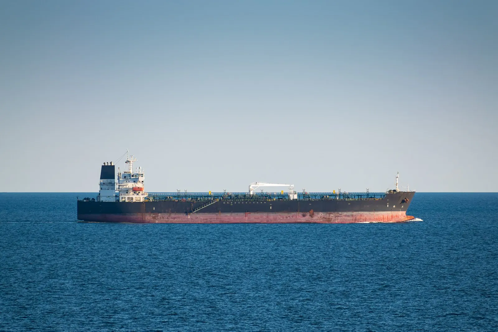 Product tanker under way on calm water