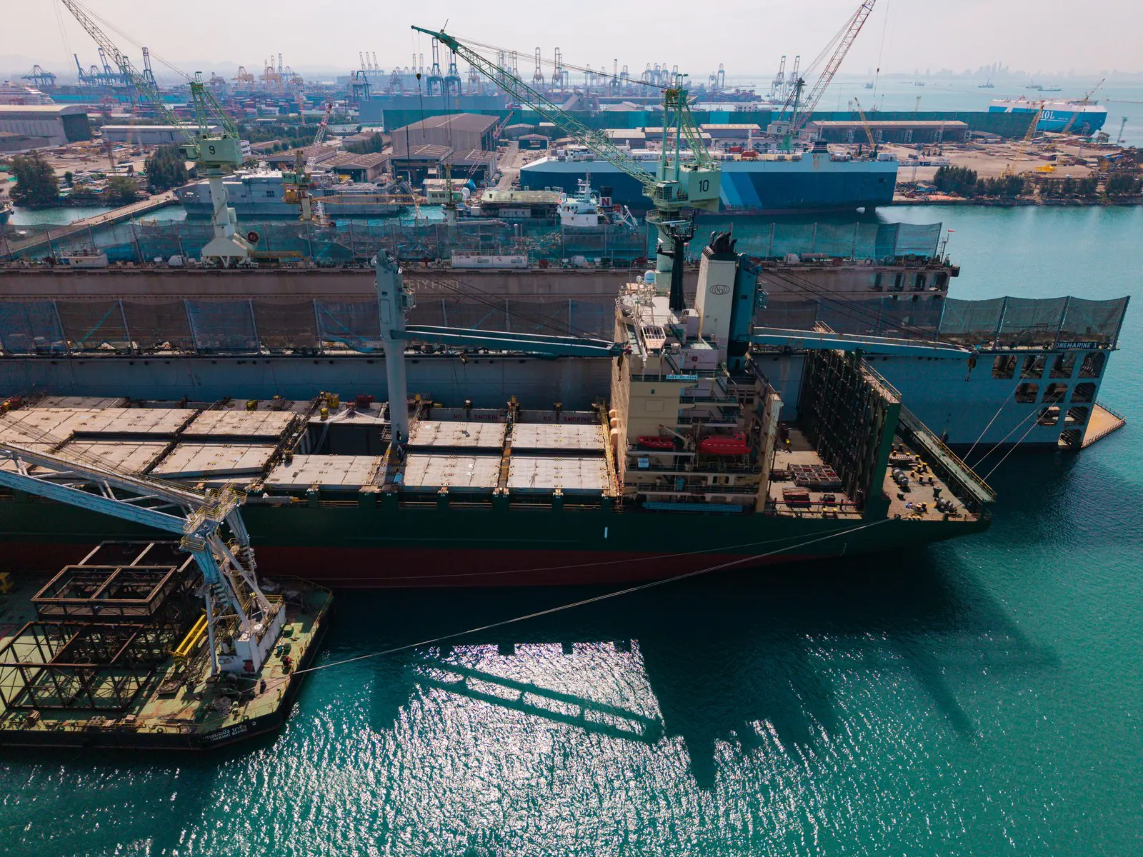 Large vessel alongside at a shipyard
