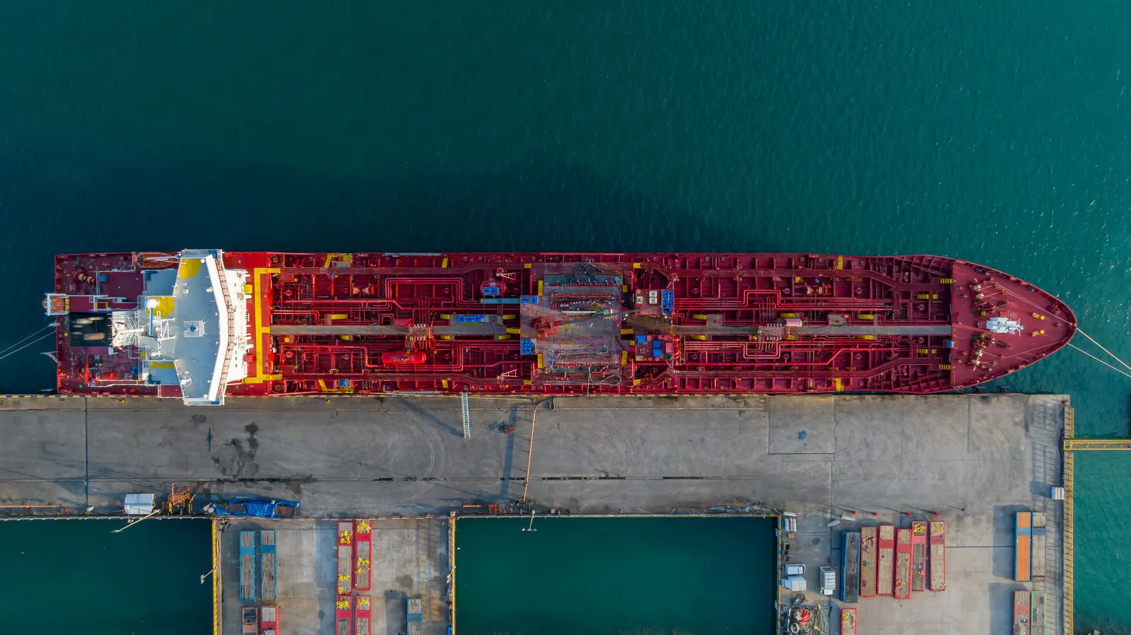Aerial view of a crude oil tanker alongside a terminal berth