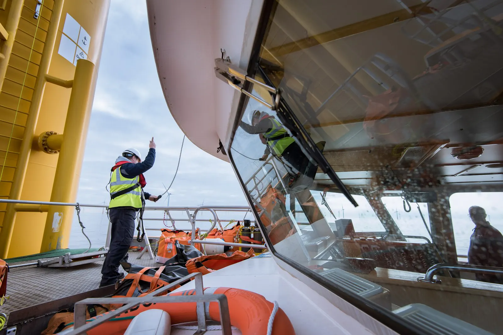 Offshore technicians working at height on a wind turbine