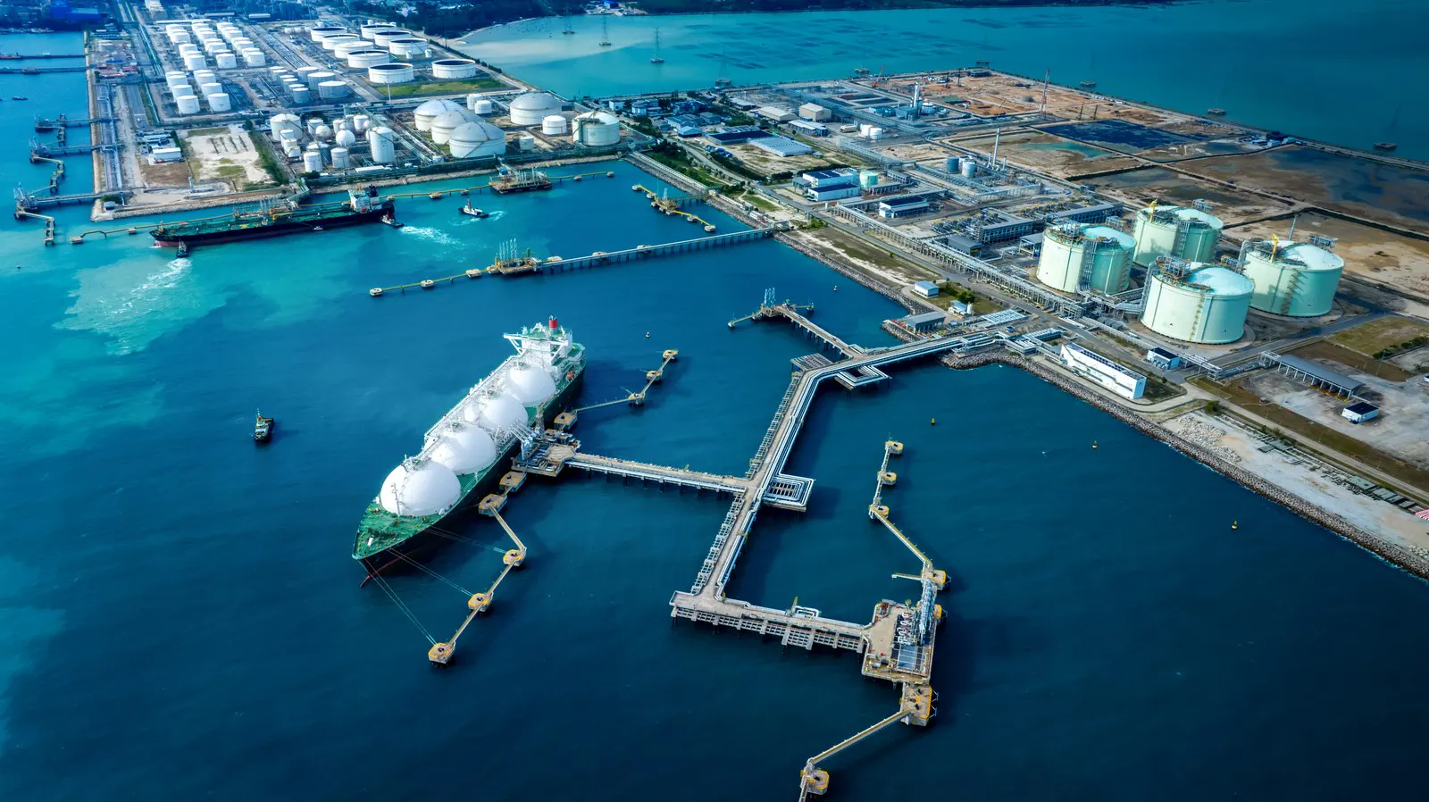 Aerial view of an LNG carrier at a gas terminal