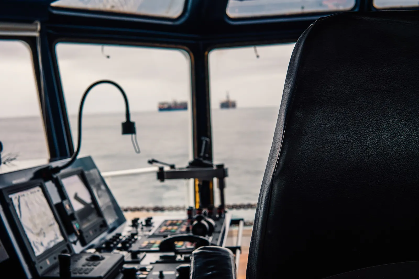 A ship's bridge console and telegraph handles