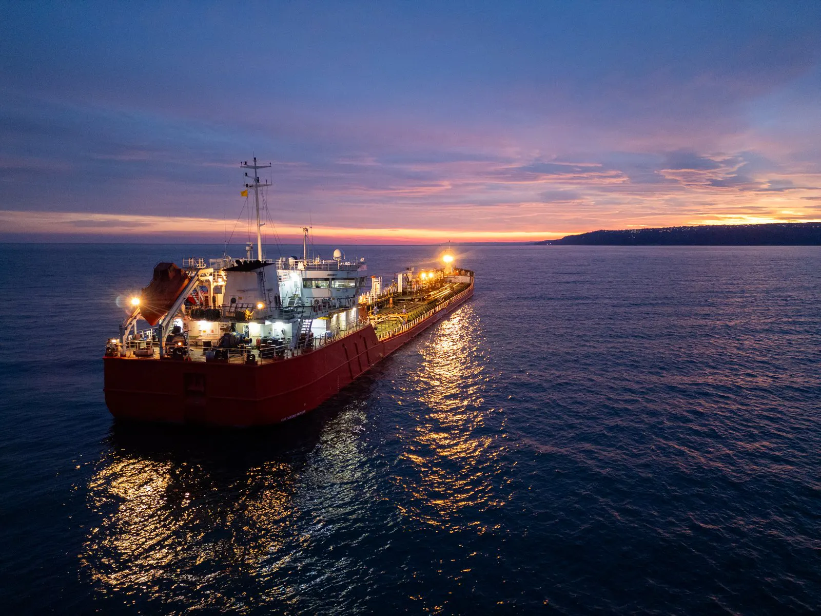 A tanker under way at dusk