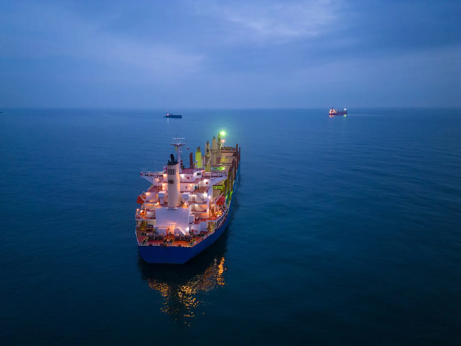 Bulk carrier under way on open water seen from the air