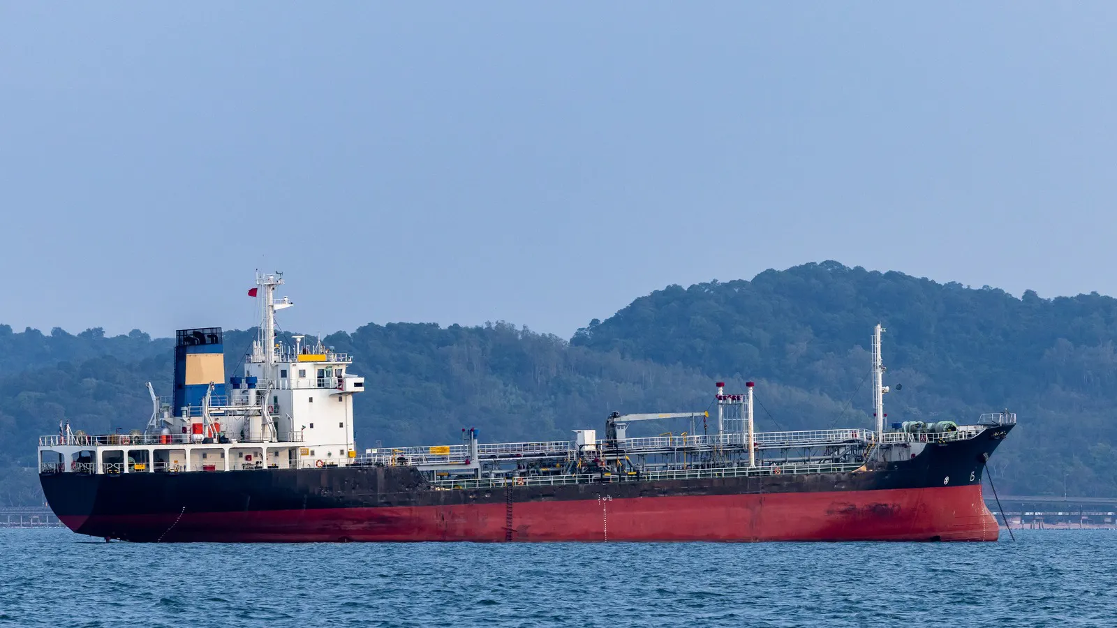 Large crude oil tanker under way on calm water