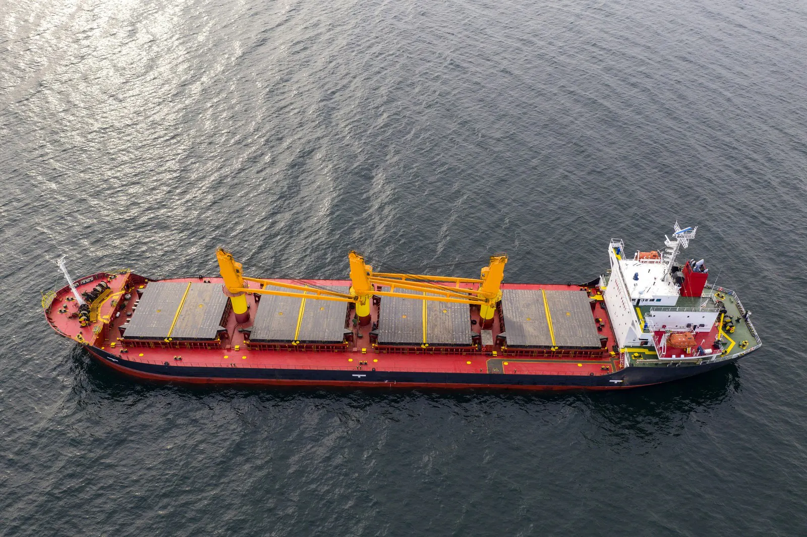 Geared bulk carrier under way on open sea