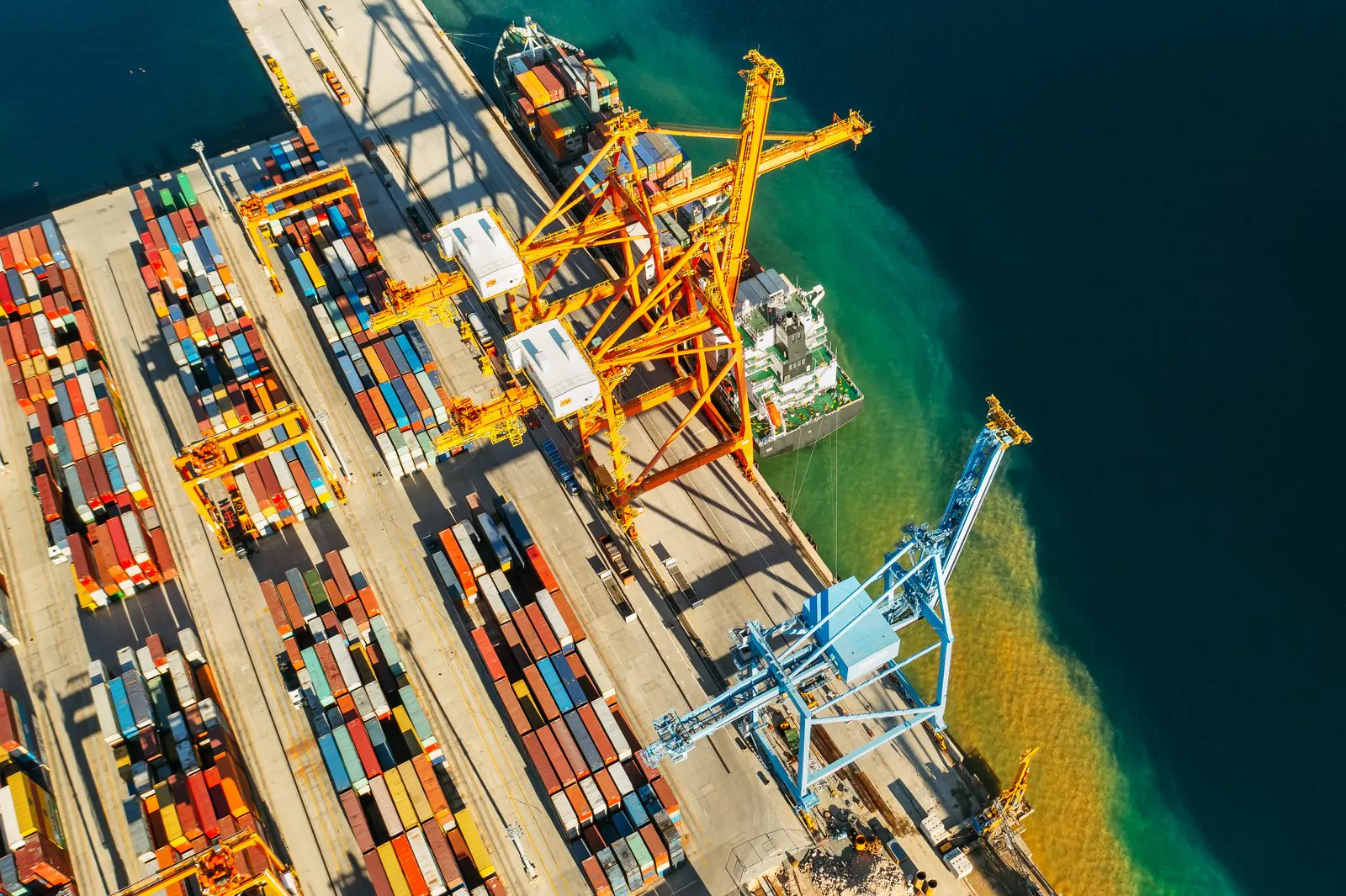Container terminal with stacked boxes and gantry cranes