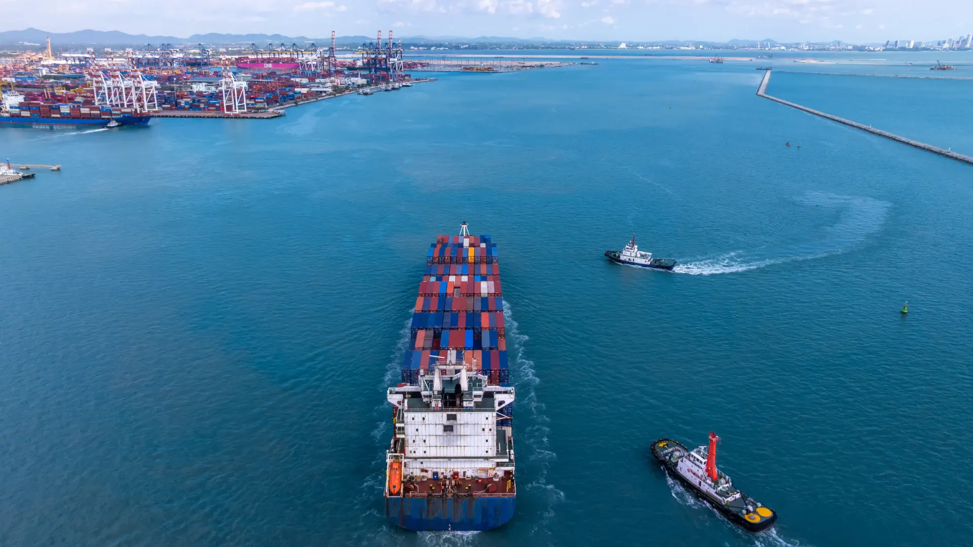 A large container ship under way, seen from the air