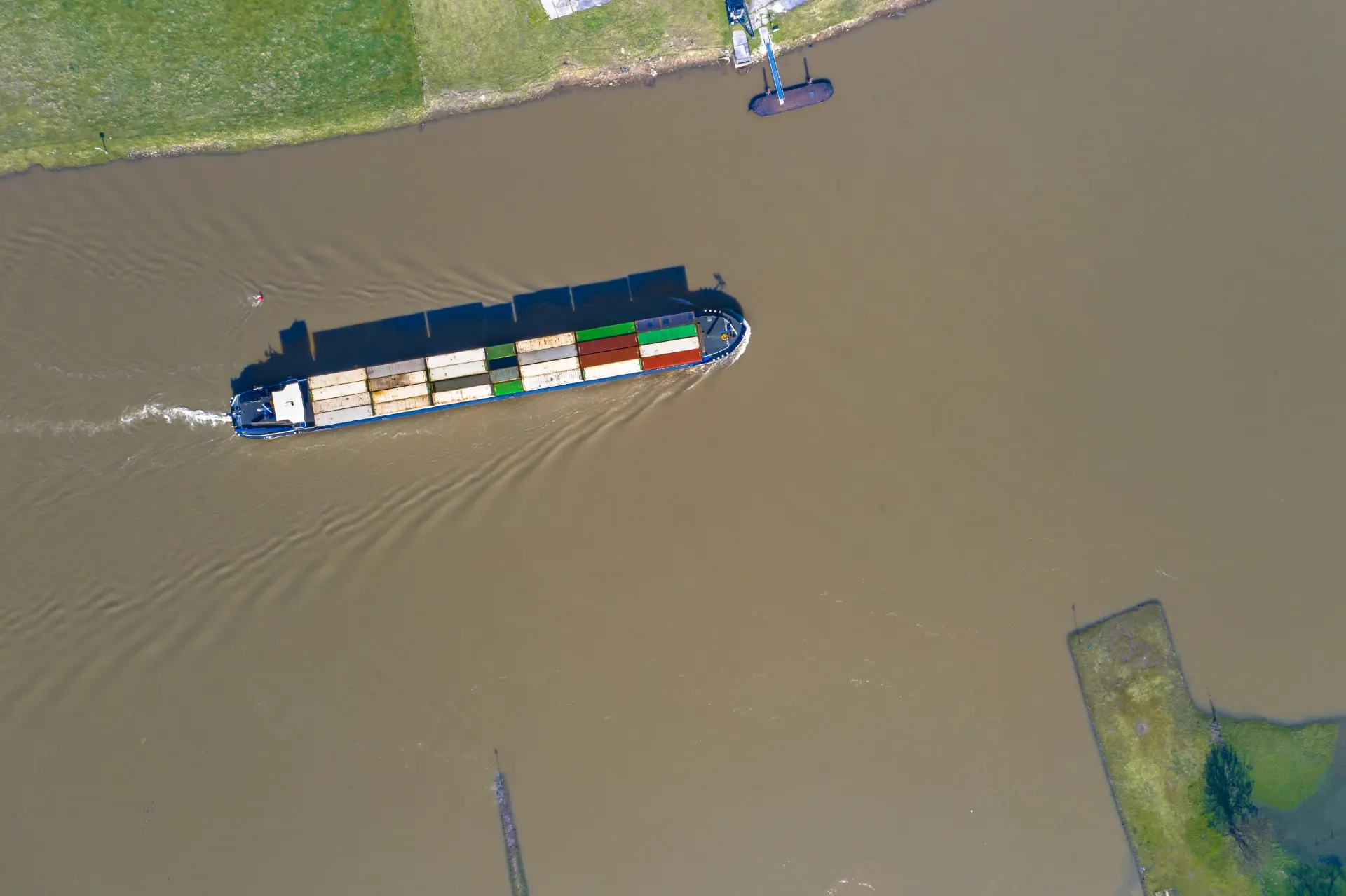 Aerial view of a short-sea general cargo vessel underway