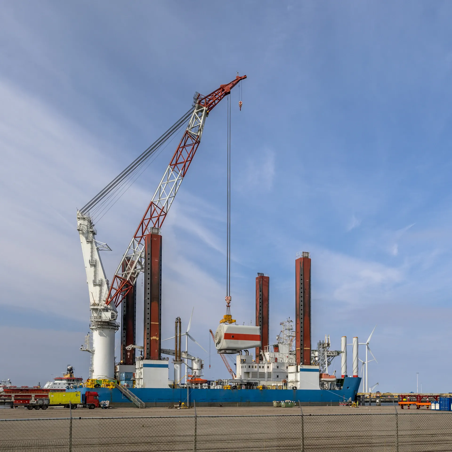 Construction vessel lifts turbine component on a s