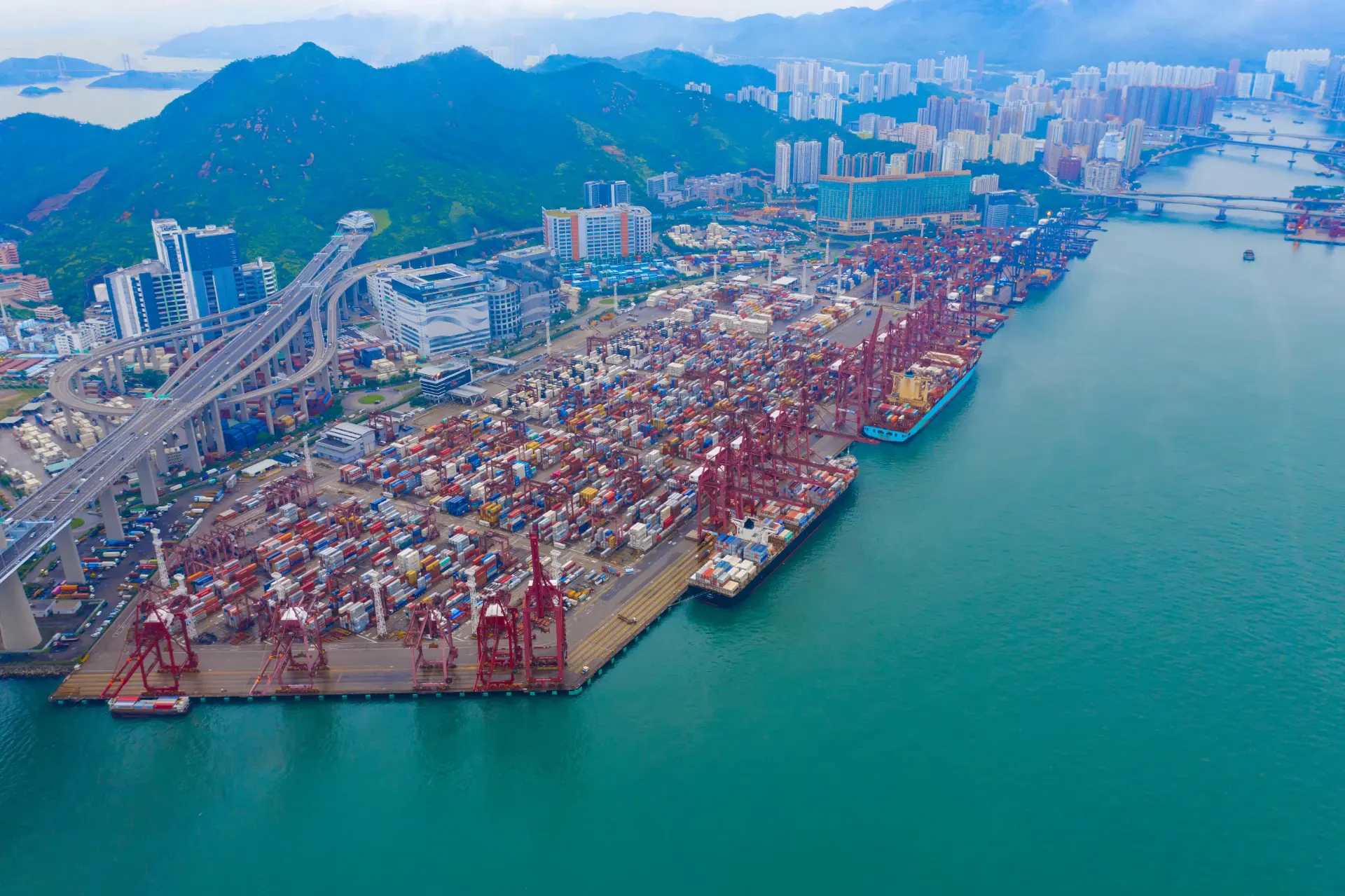 A laden container ship under way on an ocean trade route