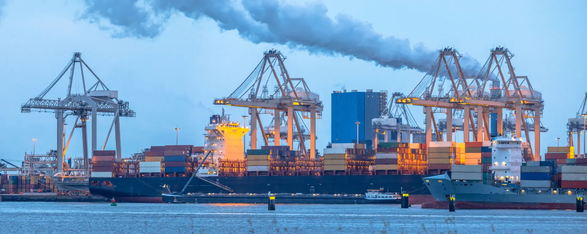 Container ships working cargo at the Tweede Maasvlakte in Rotterdam
