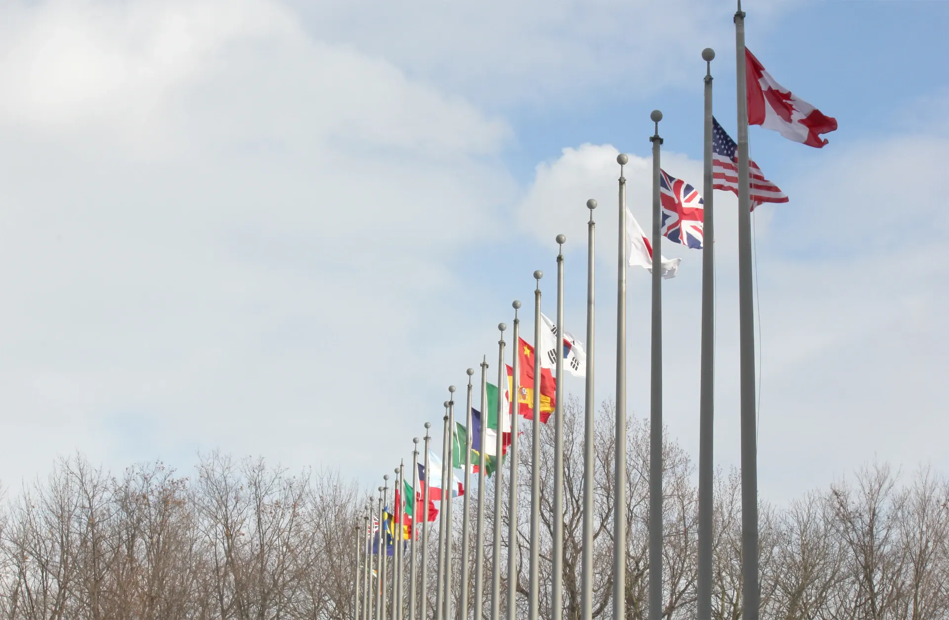 National flags of many countries flying side by side