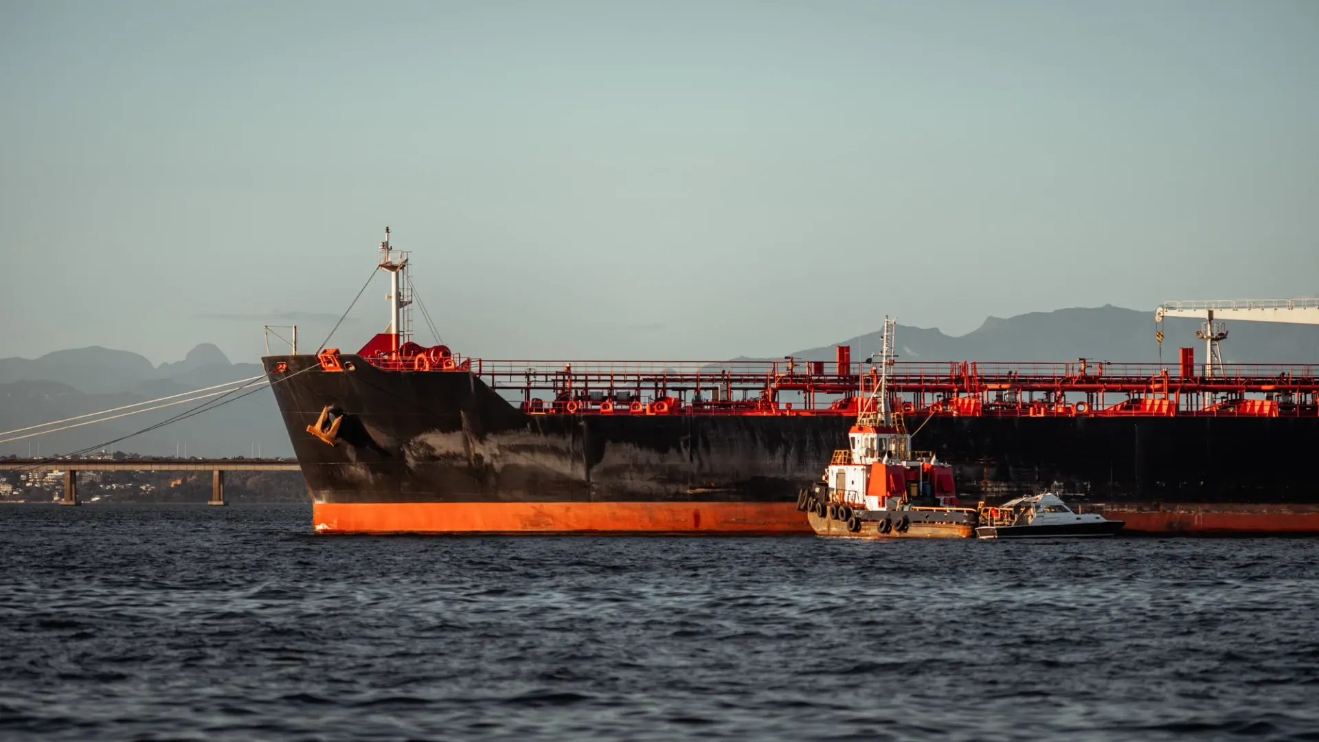Crews are cleaning six to eight miles of coastline by hand as salvage waits on the monsoon