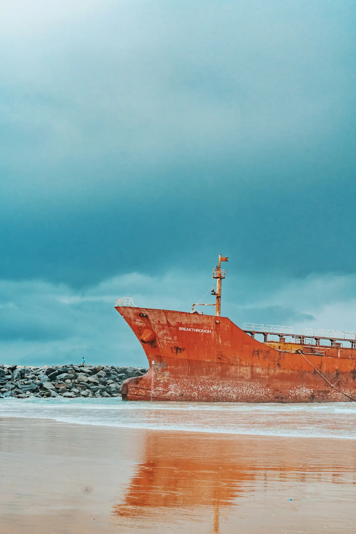 Rusting ship on the shore