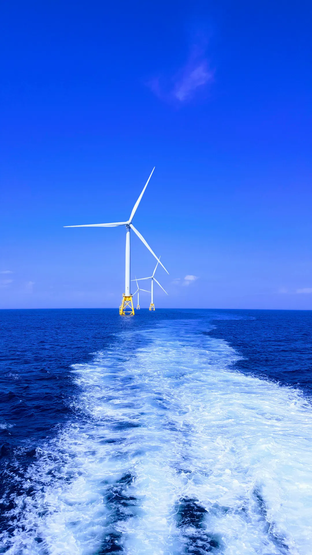 Crew transfer vessel alongside an offshore wind turbine