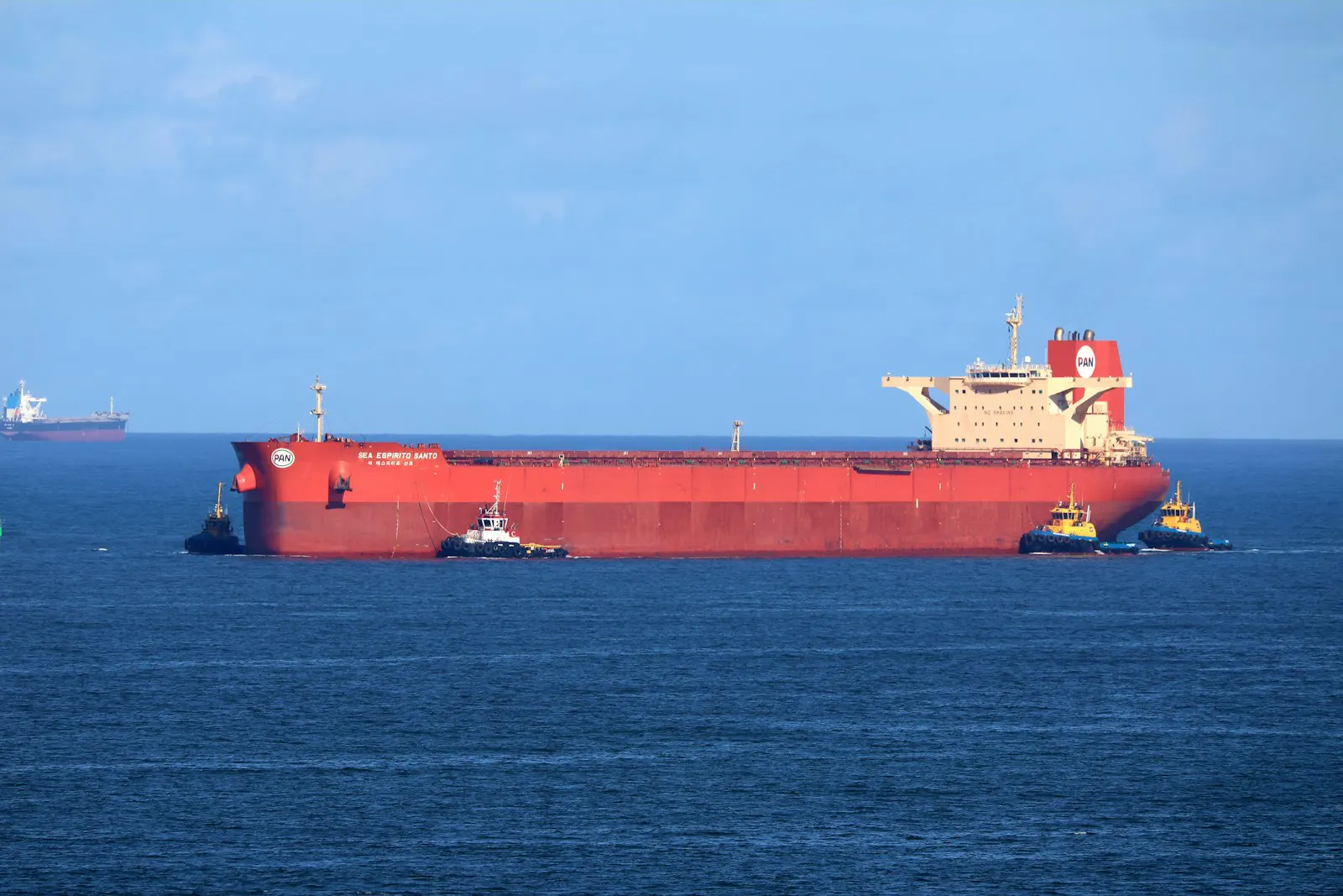 Container ship sailing through open water