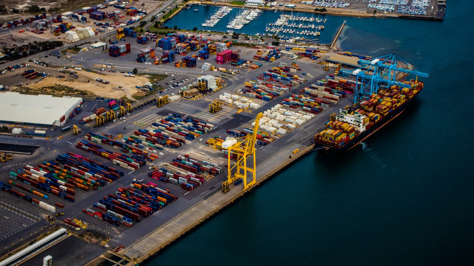 Feeder container ship at a terminal