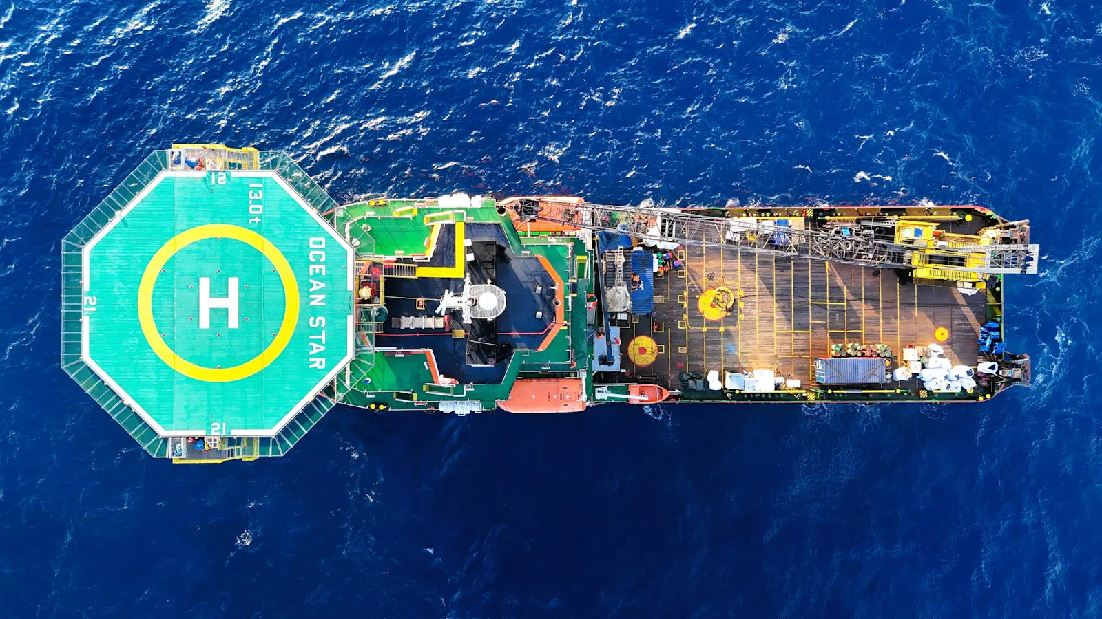 Offshore vessel with helideck at sea